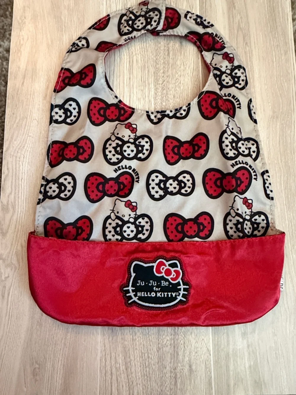 Ju-Ju-Be Hello Kitty Red and White Baby Bib with Bow Motif